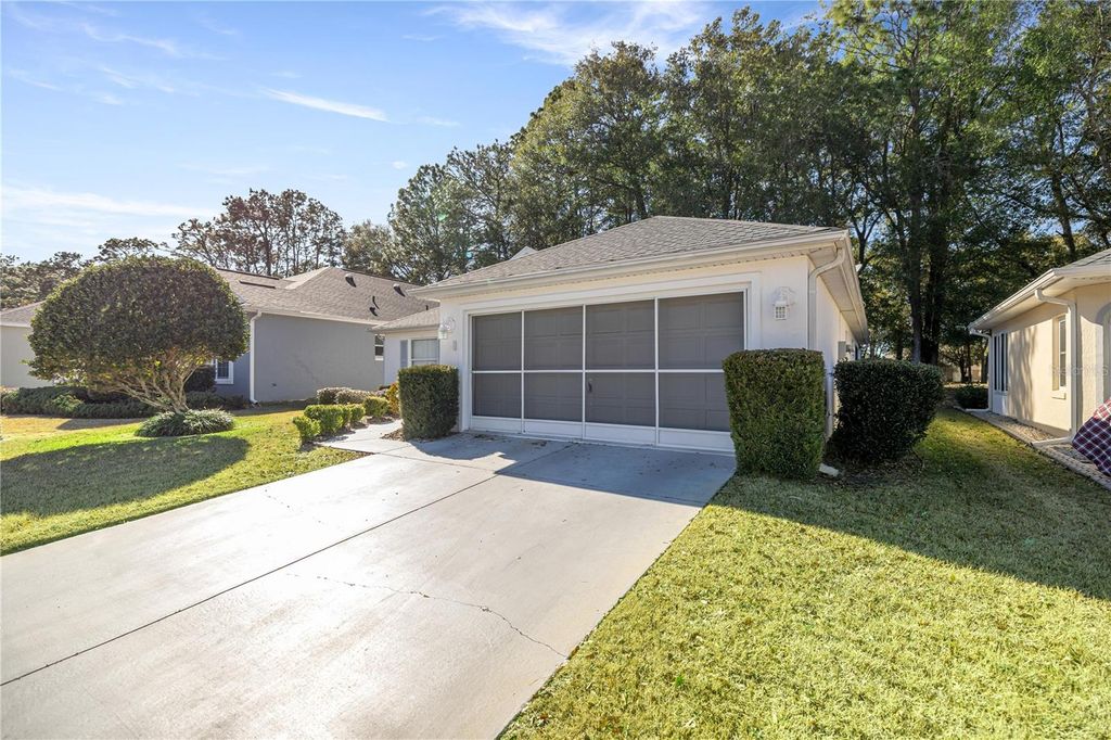 Photo of 10891 SW 69th Circle, Ocala, FL 34476 (MLS # OM718256)