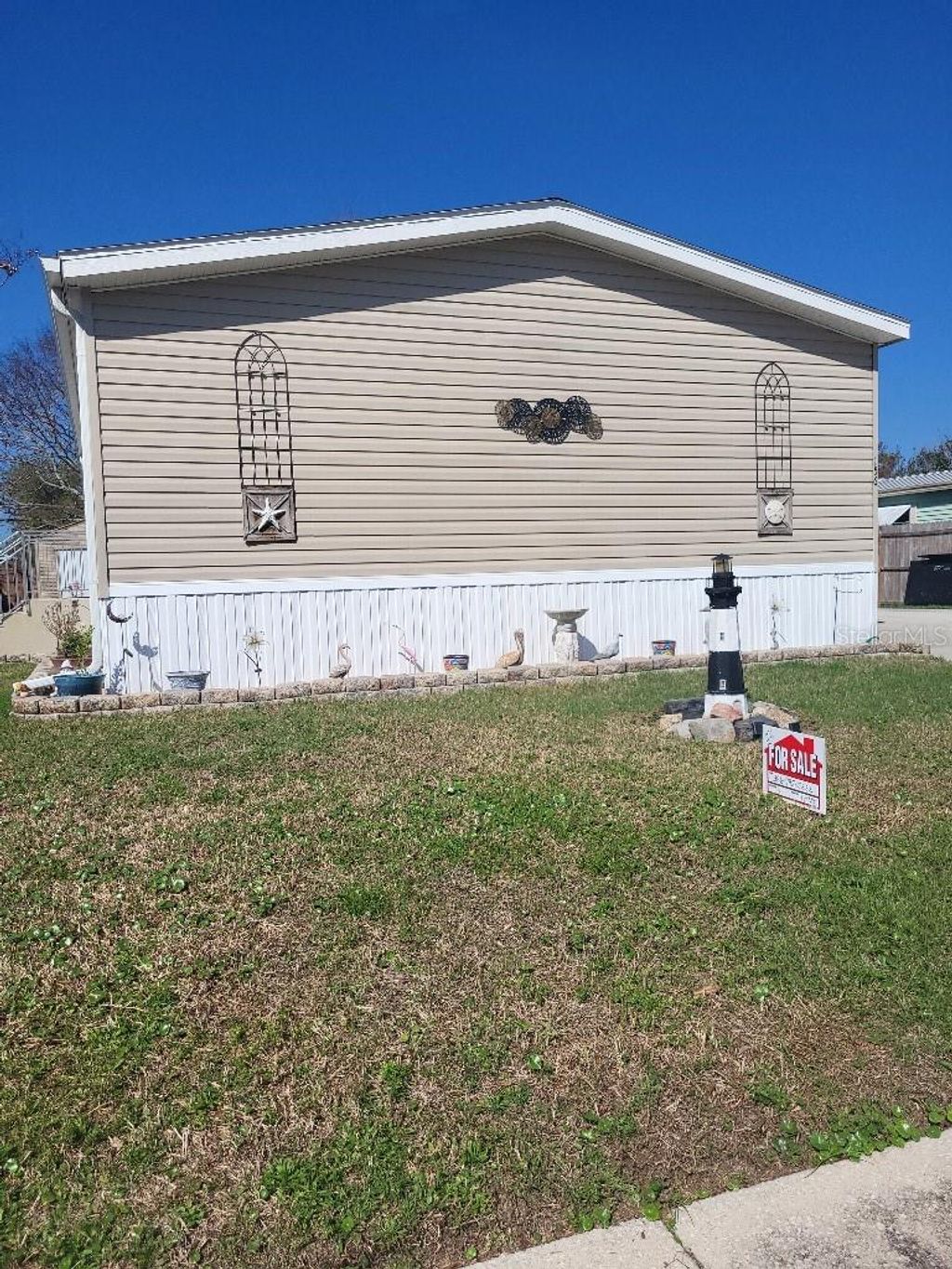 Photo of 156 Sand Pebble Circle, Port Orange, FL 32129 (MLS # TB8485461)