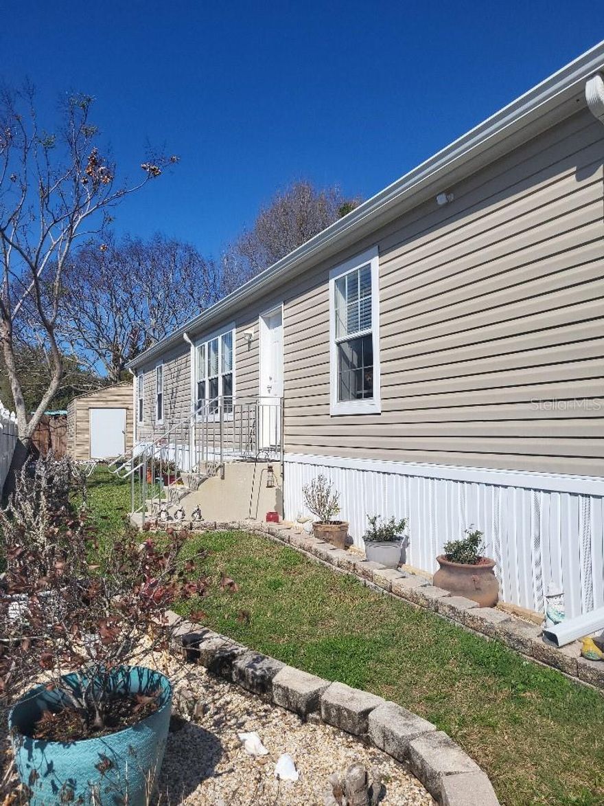 Jacobson 2020 Manufactured Home with Double Insulation and Hurricane Impact Windows. No HOA and No Lot Rent! Large His and Her Sheds with Electricity. 4ft deep Swim Spa is heated in Winter and Cool in the Summer. Oversized Driveway for Boat or RV Parking. The House and Driveway and Sheds and Swim Spa all 5 years old. Lowest Flood Rating of 1 on scale of 1 to 10. Location Location Location! Only 2 miles to the beach and 6 miles to International Speedway Racetrack.