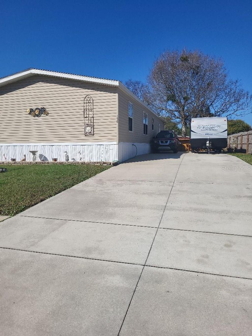 Photo of 156 Sand Pebble Circle, Port Orange, FL 32129 (MLS # TB8485461)