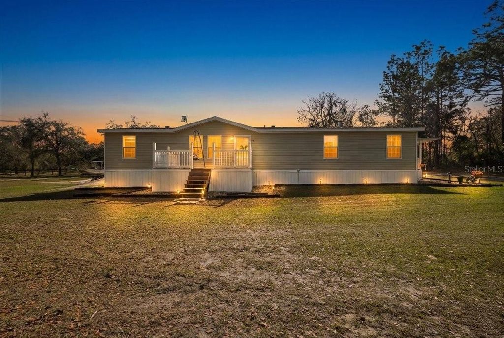 Photo of 11990 SE 55th Lane, Morriston, FL 32668 (MLS # W7882165)