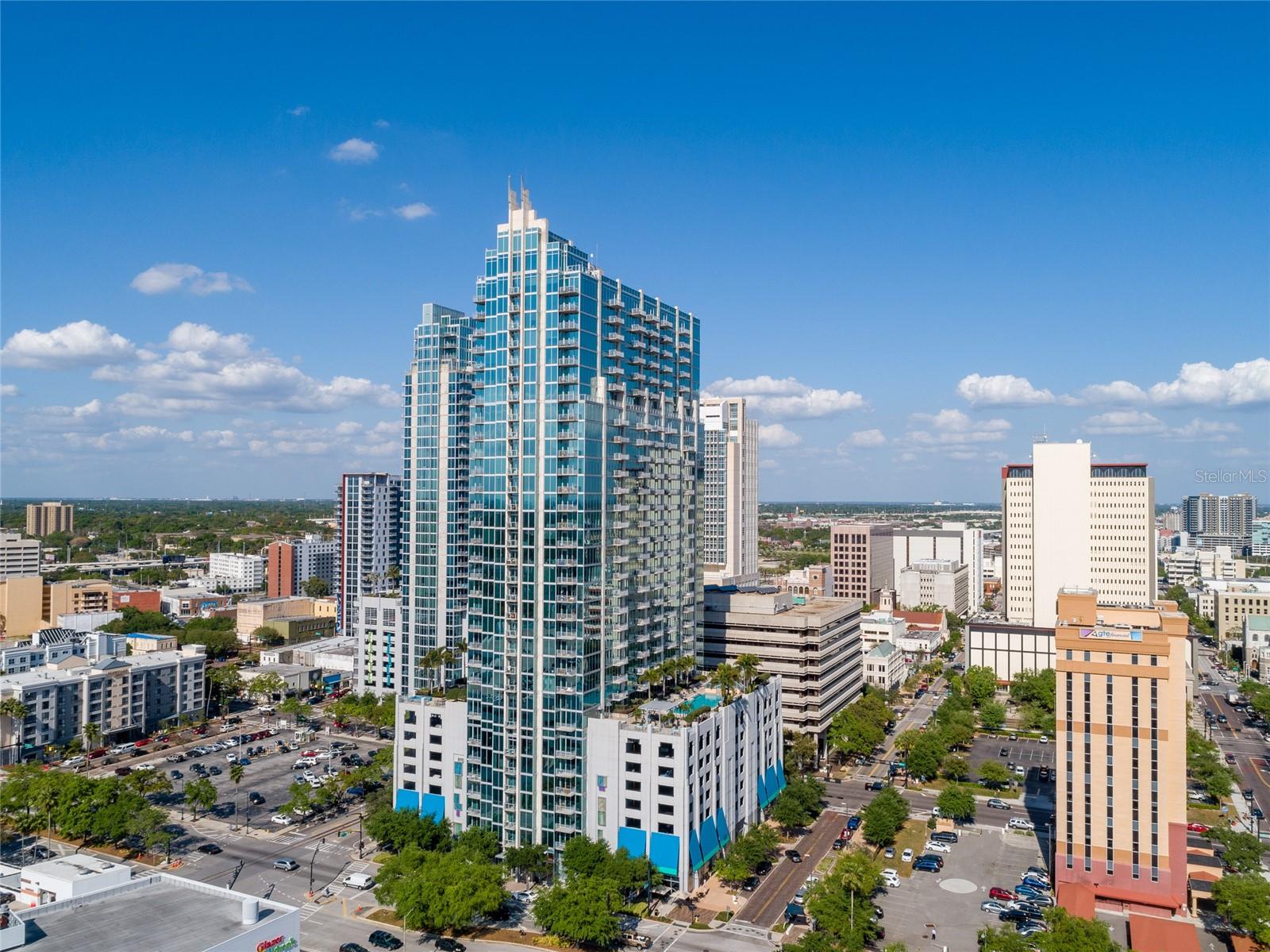 This modern end unit on the 4th floor of Skypoint in downtown Tampa is ready for its new owner! Skypoint is 33
floors high and has over 300 units-- this unit is one of 12 in the whole building that has a covered and reserved parking space in the
garage right next to your front door. This makes it perfect for the buyer who wants some additional privacy and convenience with high
rise condo living. As you walk into this unit, you will find a private foyer leading into the unit that has an open floor plan overlooking
Curtis Hixon Park and the Hillsborough River. This end unit contains 40 linear feet of floor to ceiling glass windows and two private
balconies, one off the dining area and one off the master bedroom. Both balconies offer stunning sunset views of Downtown Tampa.
The unit features a spacious master bedroom with connected bath, dual vanities and an oversized garden tub. The second bedroom
is loft style while still offering privacy and also has a full bath. The laundry room is tucked by the second bedroom and features
access to a private one way out rear fire escape as well as a small storage area. Come see this one of a kind end unit and enjoy the
luxury amenities of one of the most coveted high rises in the Downtown Tampa area!