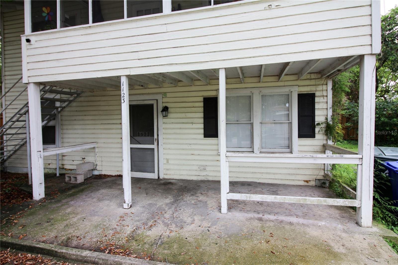Downstairs 2 bedroom, 1 bath apartment in Historic Dixieland. This wonderfully updated unit features a newer kitchen with stainless steel appliances and granite countertops. Entire house has wood look ceramic tile and fresh paint colors. The master bedroom has a walk in closet with access to the bathroom. The bathroom has been updated with newer vanity and tile. Bedroom 2 has its own exterior door prefect for a roommate situation. On the back of the unit you will find a laundry room with washer and dryer hookups. There is a small sitting area with a covered front porch. Lawncare included. This quiet gem is just one street off South Florida just 2 minutes from Cob and Pen and historic Dixie Land with lots of shopping and dining options and 2 blocks from the Lake Hollingsworth walking path. Sorry, no pets.