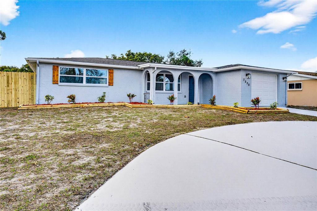 Photo of 7538 Gulf Highlands Drive, Port Richey, FL 34668 (MLS # TB8477725)