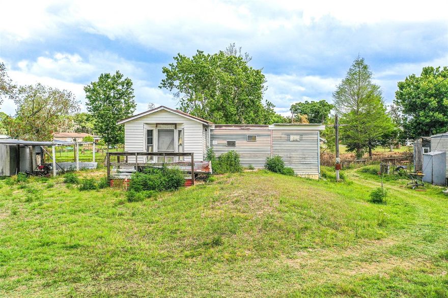 Vacant Lot with Canal Frontage! This .3-acre property offers beautiful canal frontage leading directly to Lake Lowery, perfect for boating, fishing, or enjoying peaceful sunsets and wildlife views. This is a rare opportunity to build your dream lakefront retreat from the ground up. The holding tank is at the front of the property, and the well is located under the former carport. With its prime waterfront location, this lot is the perfect canvas for your ideal peaceful sanctuary on the water.