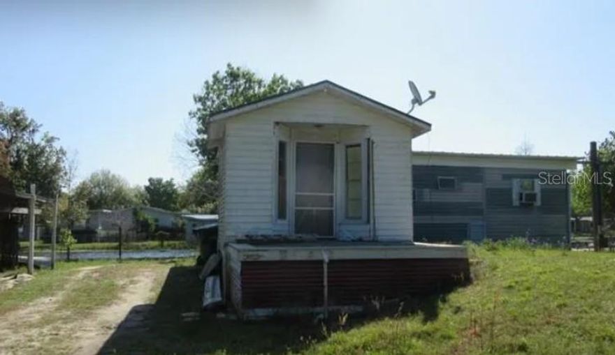 Vacant Lot with Canal Frontage! This .3-acre property offers beautiful canal frontage leading directly to Lake Lowery, perfect for boating, fishing, or enjoying peaceful sunsets and wildlife views. This is a rare opportunity to build your dream lakefront retreat from the ground up. The holding tank is at the front of the property, and the well is located under the former carport. With its prime waterfront location, this lot is the perfect canvas for your ideal peaceful sanctuary on the water.