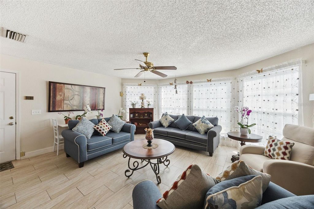 Photo of 935 Northern Dancer Way #105, Casselberry, FL 32707 (MLS # O6387980)