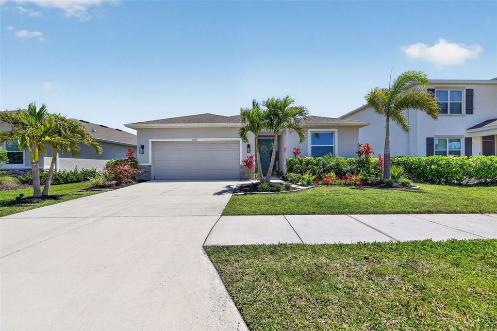 Photo of 5667 Woodland Sage Drive, Sarasota, FL 34238 (MLS # A4690658)