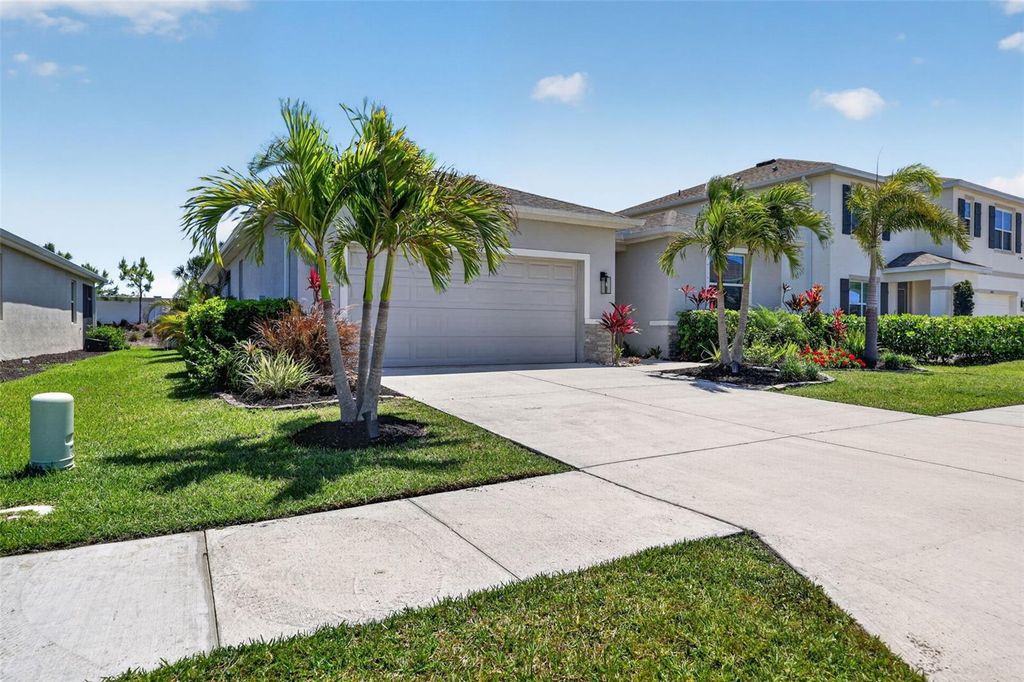 Photo of 5667 Woodland Sage Drive, Sarasota, FL 34238 (MLS # A4690658)