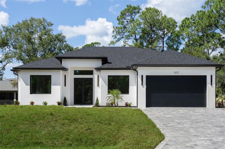 One or more photo(s) has been virtually staged. Welcome to your new home, a stunning 4-bedroom, 2-bathroom haven in North Port, one of the fastest-growing cities in the nation! Boasting an open floor plan and meticulous attention to detail, this residence is move-in ready and radiates pride of ownership inside and out. Nestled in a prime location with no HOA fees and no flood insurance required, this home offers peace of mind and convenience. Step inside to discover the grandeur of the enormous living room, adorned with 12ft high ceilings and expansive windows that flood the space with natural light. The adjacent kitchen is a chef's dream, featuring Quartz countertops, stainless steel appliances, and ample storage space. The spacious master bedroom offers 10ft tall ceilings, a large walk-in closet, and a luxurious en-suite bathroom with his and hers sinks. From luxury vinyl floors to an oversized driveway, this home is packed with features both inside and out. Rest assured knowing this home is hurricane-ready with impact windows and doors. Savor your evenings outdoors on the large covered lanai, perfect for relaxation or entertaining guests. Located in the highly rated Sarasota County school district and close to I-75, shopping, dining, and Gulf beaches, this home offers the perfect blend of convenience and luxury. Don't miss out on the opportunity to make this piece of paradise yours, call today and take the first step towards owning your dream home!