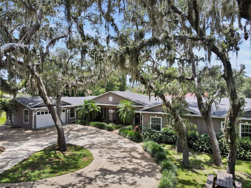 Large Price Deduction!!!

Stunning 5-Bedroom Multigenerational  Lakefront Retreat – almost 5000 Sq Ft of Heated Living Space! 

Nestled on a picturesque private lake, this expansive 5-bedroom, 3.5-bath home offers 4,887 square feet of heated living space, perfect for entertaining or accommodating multi-generational families. Separate entry off the porch makes a perfect in law suite. Two bedroom, or use one as sitting room, with a full bath in between.  Enjoy breathtaking lake views and endless outdoor activities including skiing, fishing, and boating right from your backyard.

Step into an impressive foyer that opens into a spacious living room, creating an inviting and open atmosphere. To the left, find a formal dining room ideal for special occasions, while to the right, multiple entertaining areas provide plenty of space to gather with family and friends. Home features 2 fireplaces, one electric and one wood burning. Large, open windows throughout the home offers stunning lake views from several rooms, bringing the beauty of the outdoors inside.

Set on over an acre of beautifully landscaped grounds, this residence boasts numerous recent upgrades including a brand-new roof (2024), modern AC system (2021), new plumbing (October 2024), and blown-in insulation for enhanced energy efficiency. Additional features include termite bonds, LeafFilter gutter protection, and new flooring in multiple rooms.

The kitchen shines with upgraded granite countertops and seamlessly connects to cozy sitting areas,  providing ample space for relaxation. The recently remodeled bathrooms add a fresh, contemporary touch. For fitness enthusiasts, there’s a dedicated workout room, while flexible living spaces allow for easy conversion to additional bedrooms if needed.

This home perfectly combines comfort, functionality, and lakeside lifestyle — an exceptional opportunity you won’t want to miss!