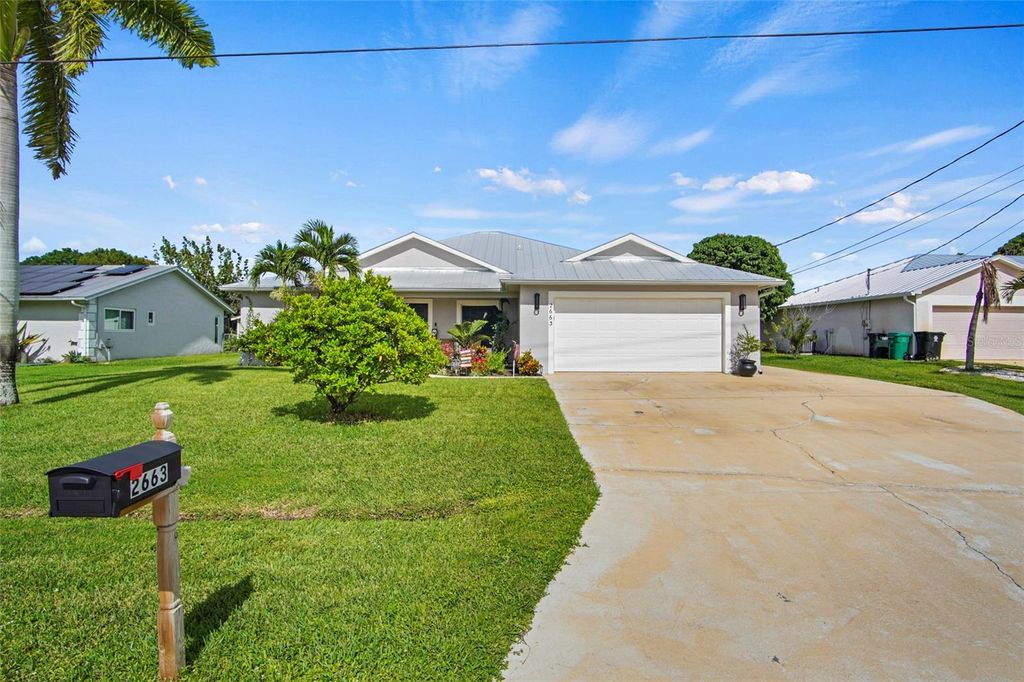 Photo of 2663 SW Chestnut Lane, Port Saint Lucie, FL 34953 (MLS # OK225662)