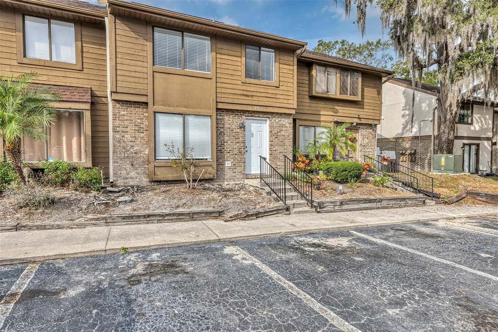 Photo of 4904 Silver Oaks Village, Orlando, FL 32808 (MLS # O6431768)
