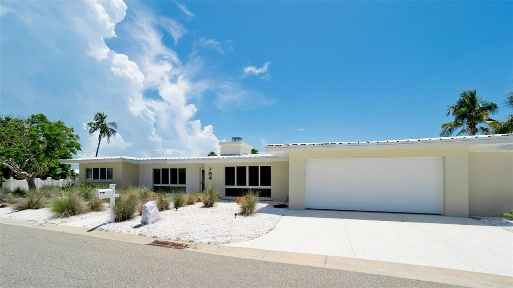 Photo of 784 Saint Judes Dr N, Longboat Key, FL 34228 (MLS # A4661229)
