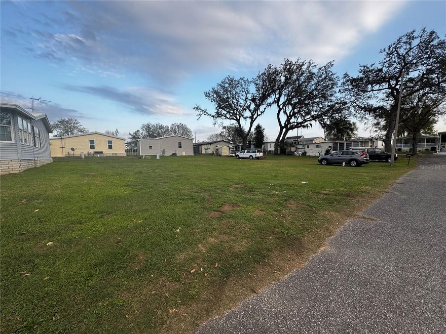 Build your retirement retreat on this vacant lot in a welcoming 55+ community in sunny Florida. This gated community makes it possible for you to own your own land and enjoy great amenities. Relax at the pool, mingle at the clubhouse, or stroll with your pet in our spacious dog park. This community is nestled away from all the rushing city traffic but still conveniently located to a beautiful and charming Dade City.