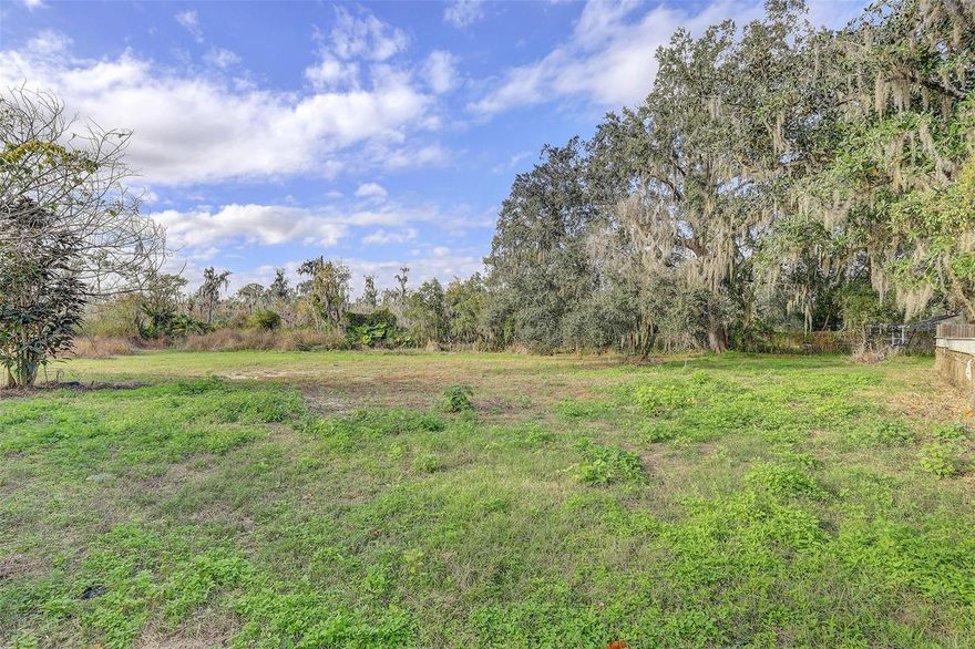 Unique 4.92 acre property featuring an existing home ready for renovations.  Two acres are located in a flood zone.  Ideal opportunity for an investor or custom builder seeking land with redevelopment or restoration potential.  Plenty of space and possibilities for the buyer!