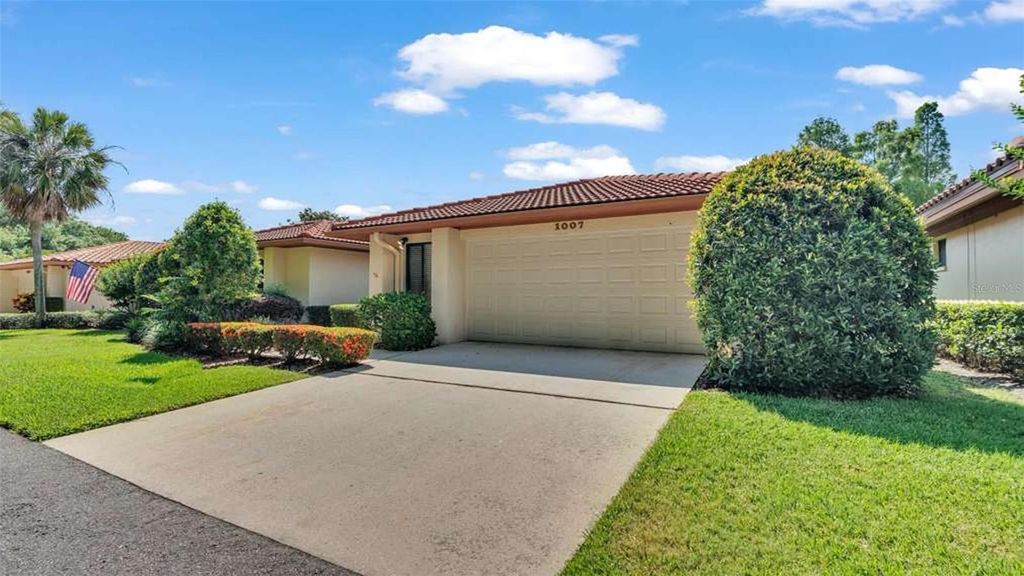 Photo of 1007 Rolling Woods Lane, Lakeland, FL 33813 (MLS # L4959853)