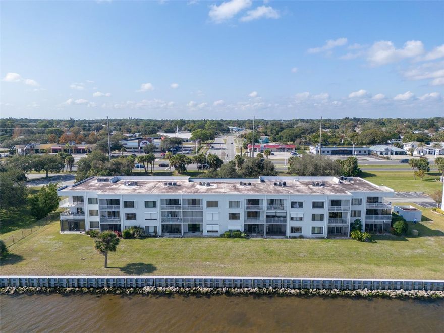 DIRECT River Views and LOW monthly HOA fees for under 200k! Wake up to gorgeous sunrises over the Indian River, watch dolphins play from your private balcony and catch spectacular rocket launches right from the comfort of your home. This condo is ready for your personal touch and features in-unit laundry, new carpet and amazing water views from both the living area and primary bedroom. Association is fully funded and offers two fishing docks, sparkling pool, tennis courts and plenty of green space dotted with mature trees. Prime location too - less than 25 minutes to Cocoa Beach with the Port St. John boat ramp, boat storage facilities, parks, shopping and restaurants nearby. Enjoy a fast and easy commute to major employers like Blue Origin, Space X and Cape Canaveral Space Force Station. Whether you are looking for a weekend getaway, primary residence or 2nd home to escape snowy winters, this condo delivers. Schedule your private showing today and live where others come to vacation!
