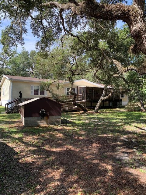 Photo of 3544 E Withlacoochee Trail, Dunnellon, FL 34434 (MLS # OM705164)