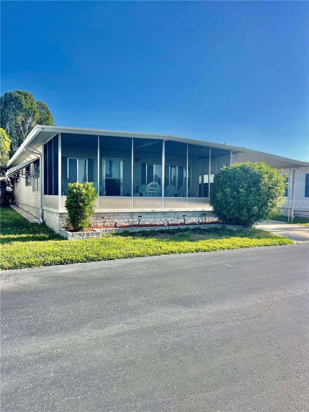 Photo of 9900 Ulmerton Road #52, Largo, FL 33771 (MLS # TB8373503)