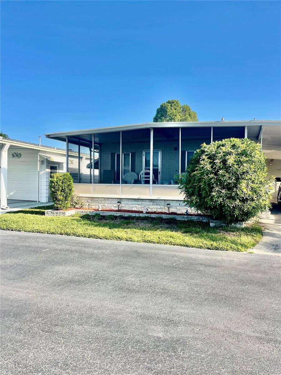 Come see this quaint home in a well maintained 55+ community, as a co-op you own the land and have a low
maintenance fee of 178.83 monthly which covers water, sewer, trash, lawn maintenance, community pool,
recreational facility up keep and an escrow reserve fund. This home features a 2 bedroom , 1 1/2 bath,
enclosed screen porch, storage shed, vinyl roof cover 2014 with a 15 year guarantee transferable
warranty, cement pad, skirting in 2010 and exterior paint. Located in a prime location near Largo Mall, Frida's
bakery ,Restaurants, Hospitals, and the Beaches. Small pets are allowed and the community offers
shuffleboard, a community pool, and has lots of activities to do every week from talent shows, dances, bingo,
karaoke, and cards. Come make this your forever home and join this fun and active community.