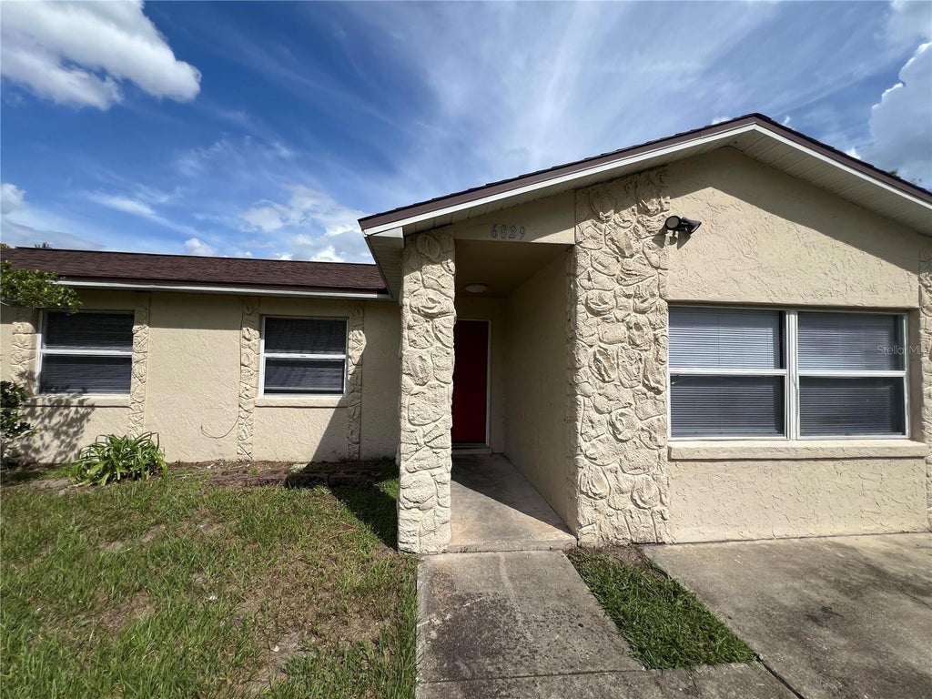 Photo of 6829 Alpert Drive, Orlando, FL 32810 (MLS # O6435040)