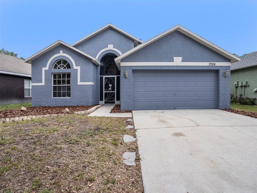 This charming 3-bedrooms, 2-bathroom home offers a perfect blend of comfort and modern living, along with a spacious 1,810 square feet. The open concept living area is perfect for entertaining's or relaxing. The property provides plenty of space for outdoor activities. The house has Solar Panels and for your convinience the electricity bill will be much cheaper. This Community boast 3 pools, plenty of green space, 2 playgrounds and a dog park. The fenced-in back yard would make a perfect space for gardening experience. Covington Park is close to shooping, St Joseph's Hospital and I-75.