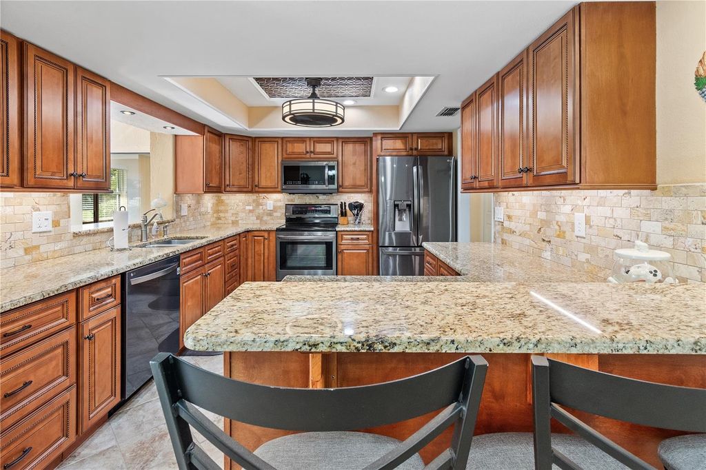 Photo of 731 Canberra Road, Winter Haven, FL 33884 (MLS # L4957294)