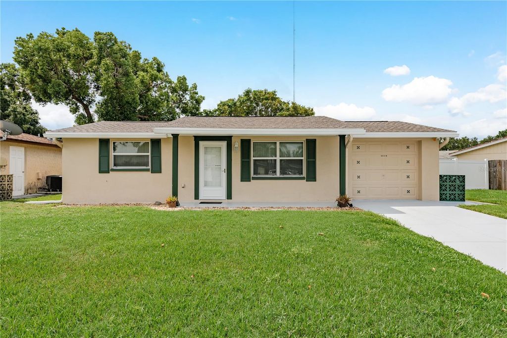 Photo of 3034 Elkridge Drive, Holiday, FL 34691 (MLS # TB8429061)