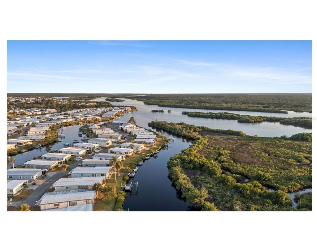 Photo of 119 Lazy River Road, North Port, FL 34287 (MLS # C7517298)