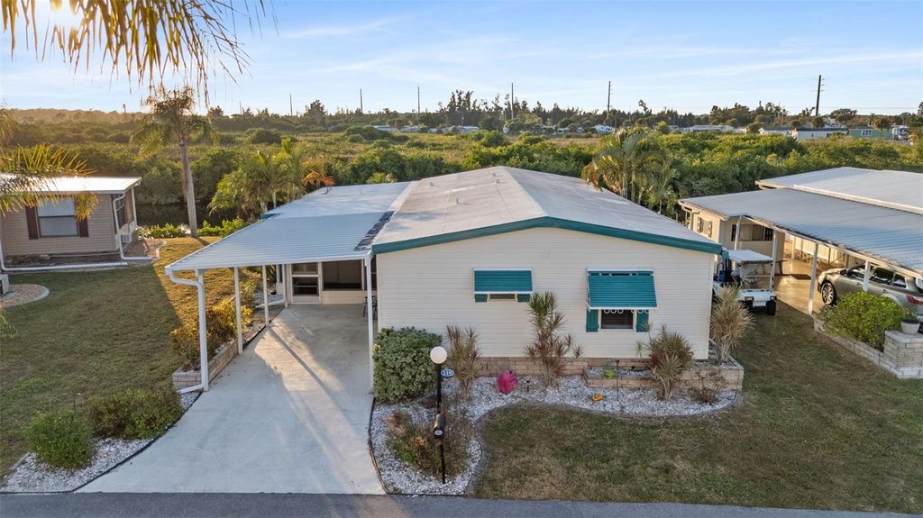 Photo of 119 Lazy River Road, North Port, FL 34287 (MLS # C7517298)