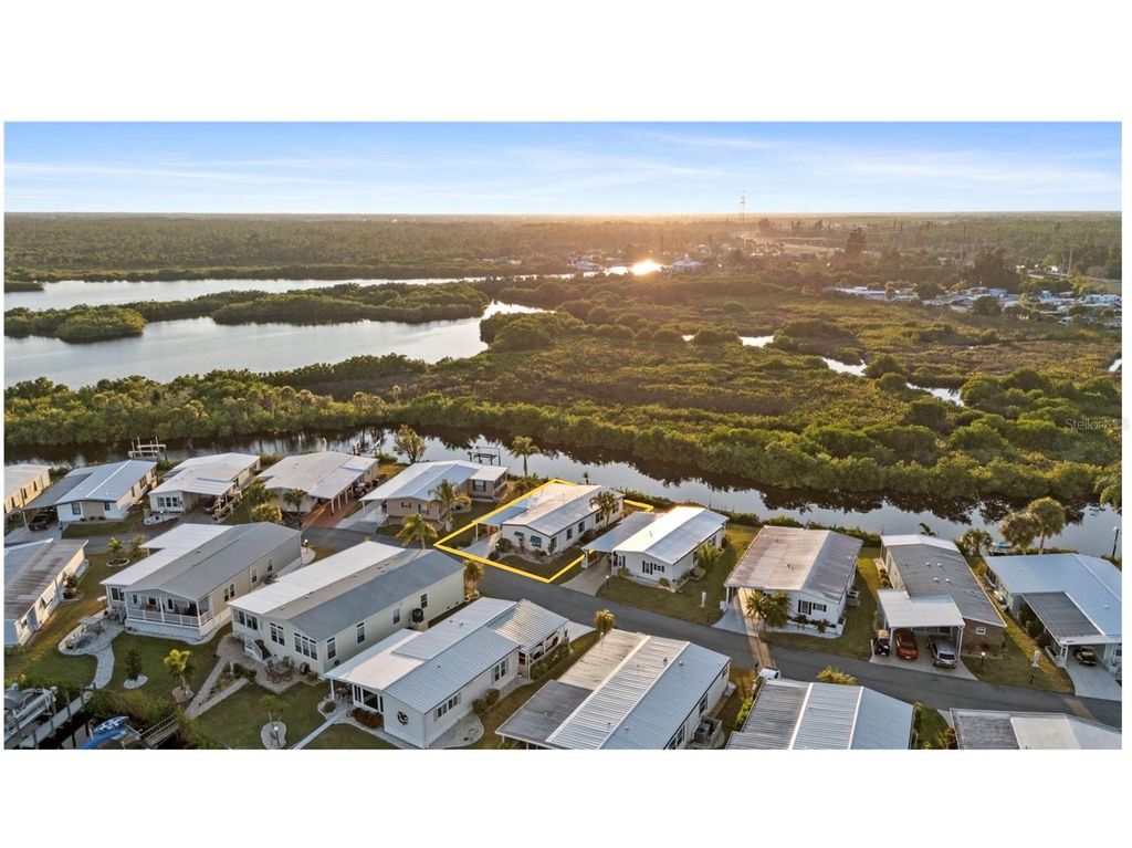 Photo of 119 Lazy River Road, North Port, FL 34287 (MLS # C7517298)