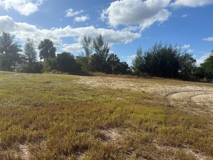 Discover the perfect spot to build your Florida dream home! This 0.23-acre vacant lot is located in a quiet and growing area of Northeast Cape Coral, surrounded by newer homes and convenient to shopping, dining, schools, and main roadways. Enjoy the flexibility of owning residential land in one of Southwest Florida’s most desirable cities—whether you’re planning to build now or hold for future investment. No HOA and no deed restrictions! Don’t miss this opportunity to secure your slice of paradise in Cape Coral. Buyer to verify utility availability and any building requirements with the City of Cape Coral.