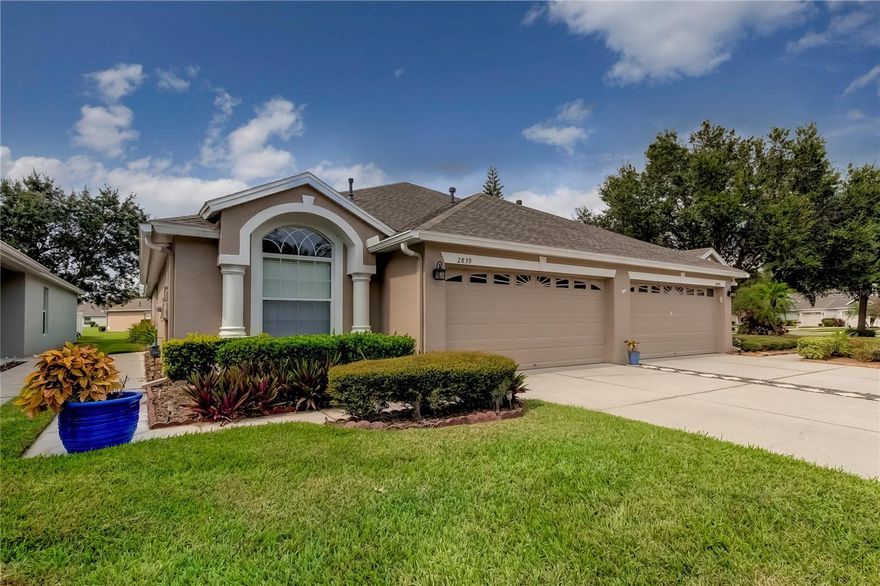 A beautiful well maintained villa. This 2 Bedroom, 2 Bathroom, Den (or office) and 2 Car Garage is both bright and open. This is not your ordinary villa, with over-sized bedrooms, bathrooms and walk-in closets in both bedrooms. This is a split plan with lots of privacy for the second bedroom and bath. The  kitchen boasts plenty of cabinet space and granite countertops, separate formal dining room. Large screened in patio, high ceilings, and neutral interior colors. Tanglewylde is a GATED community within the larger quiet Oakstead Community that offers plenty of green space,  and a beautiful community center that includes Olympic size Pool, Tennis courts, Clubhouse, Fitness center, playground, park, walking trails and more. Conveniently located just minutes from expressway, restaurants, shopping & top rated schools.