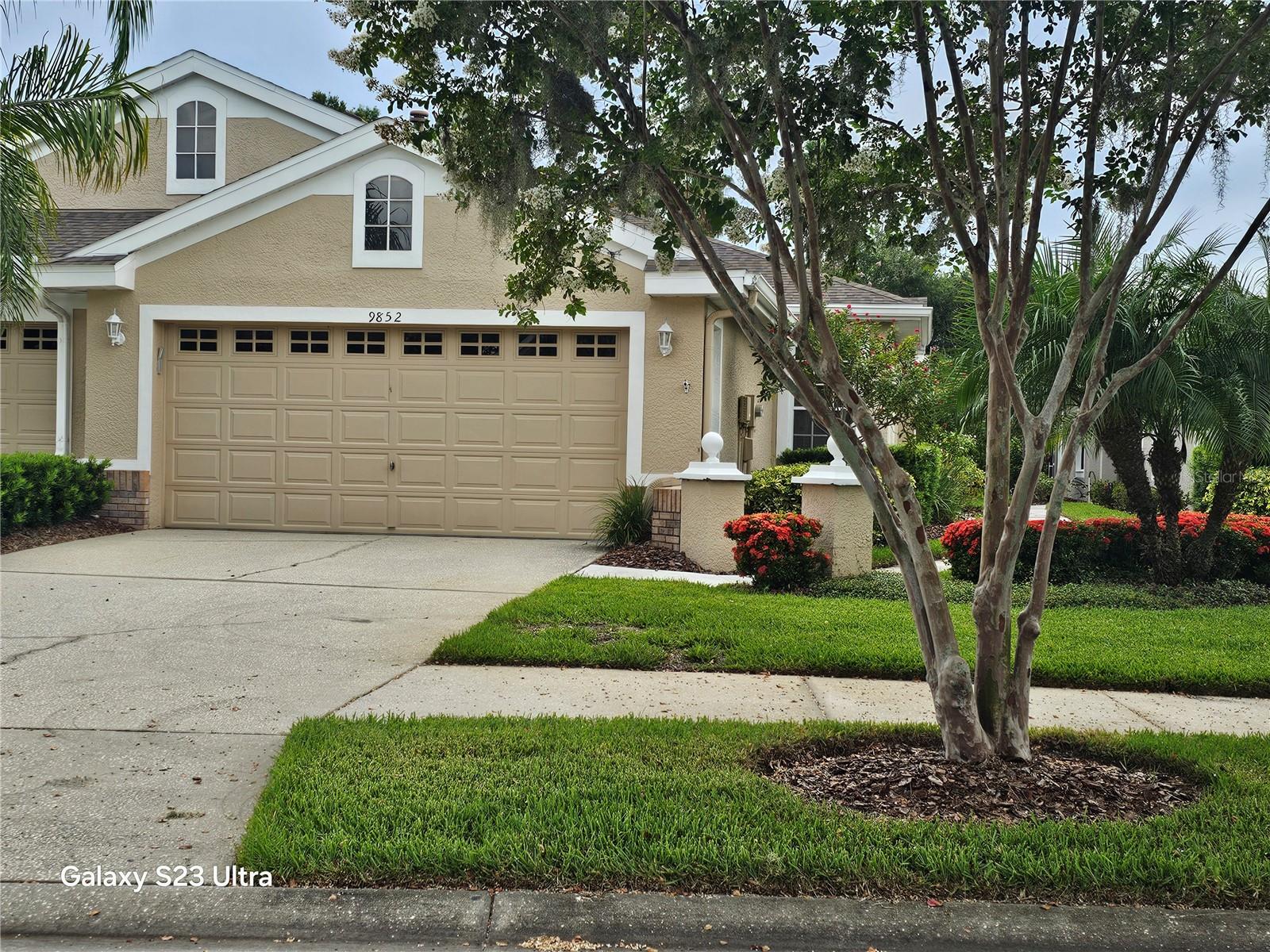 Be the First to Live in This Beautifully Remodeled Villa in Stonebridge at Westchase! Welcome to this stunning, newly remodeled villa located in the highly desirable gated community of Stonebridge in Westchase, where all ages are welcome. From the moment you step inside, you'll notice the fresh, modern upgrades that set this home apart—including brand-new waterproof vinyl plank flooring throughout the main living areas and elegant 18-inch porcelain tile in the kitchen and dining room. The completely renovated kitchen is a showstopper, featuring rich espresso cabinetry, sleek granite countertops, a stationary center island, and a convenient double-tiered counter that's perfect for casual dining or entertaining. Stainless steel appliances complete the contemporary look, offering both style and function. The spacious master bedroom offers a cozy window seat, a large walk-in closet, and a beautifully updated en-suite bath with double vanities and granite counters. Thoughtful touches like crown and baseboard molding add charm and character throughout the home, while new dual reflective windows help keep the interior cool and energy-efficient. French doors lead you to an expansive 24-by-15 enclosed lanai, complete with an additional 9-by-9 alcove—an ideal spot for relaxing or enjoying the Florida lifestyle year-round.