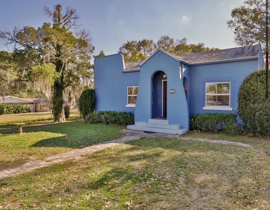 This cute 1925 Spanish Bungalow will not last long! It boasts updated A/C, ducts, electric, kitchen, bathroom and even the insulation. The flooring in kitchen and bedroom are luxury vinyl while the rest of the living areas have original hardwood. What a magnificent sight to behold.  As you enter the living room you will find a cozy fireplace and vaulted ceilings highlighted by dark stained wood beams. You will be astounded by the open concept of the home and its pleasant quaint feel. The utility room located off the Kitchen has a window A/C unit to make it more comfortable when doing laundry. The backyard is a great place for entertaining. The concrete block storage building located on the property has electric. Turn it into She Shed or Man Cave. The solar panels will be paid off and are negotiated in the list price as such. Lastly NO HOA! Call today to make your appointment to see the home.