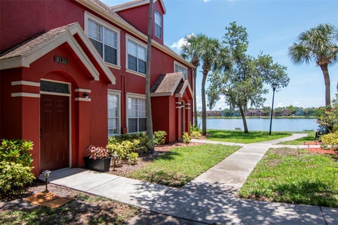 Photo of 9130 Lake Chase Island Way #9130, Tampa, FL 33626 (MLS # TB8533066)
