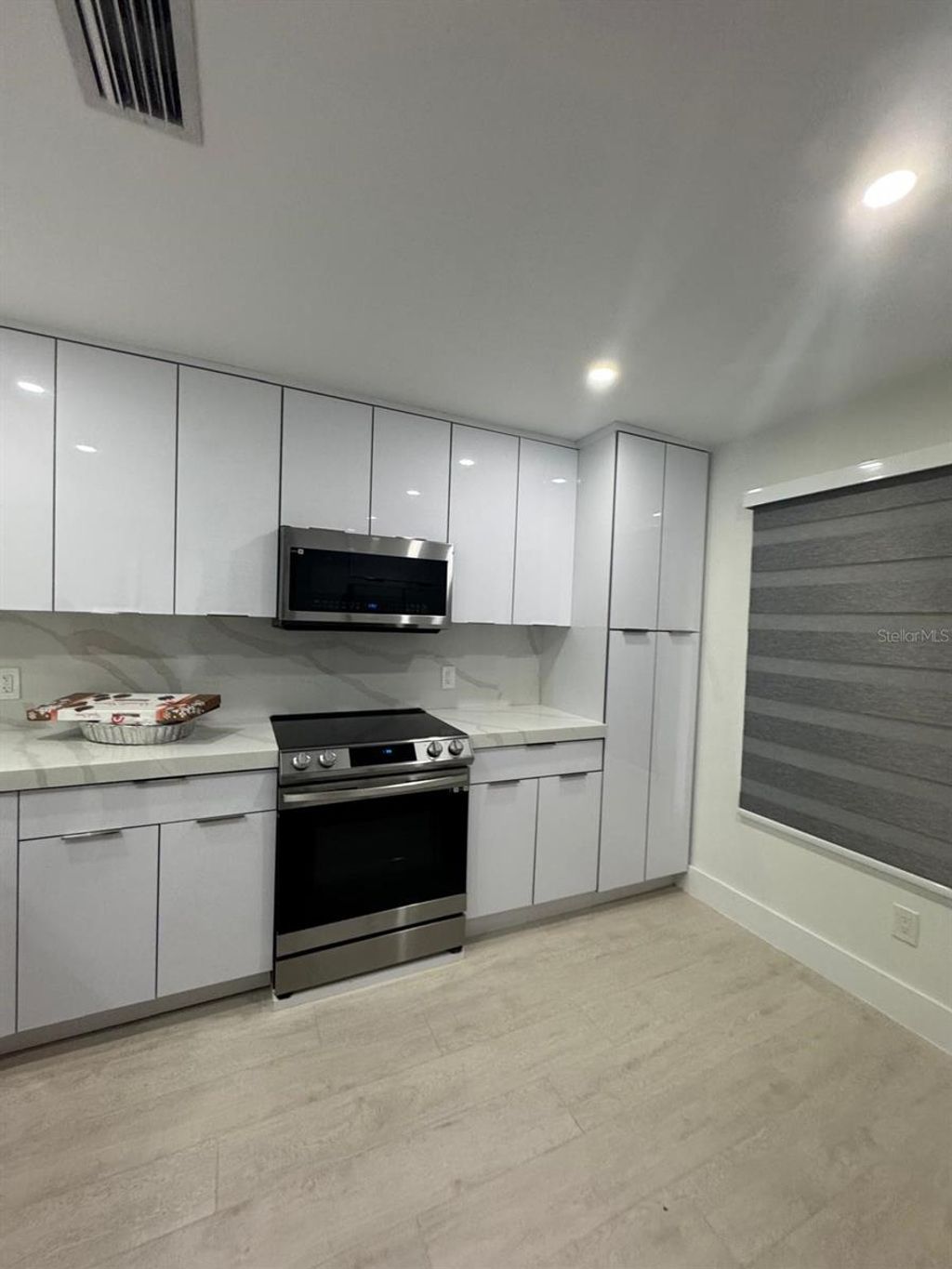 Photo of 13916 Ginger Creek Boulevard, Orlando, FL 32826 (MLS # O6387840)