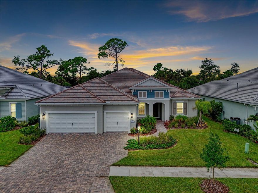 Welcome to your dream home in the sought after gated community of Grand Palm. This stunning Savannah floor plan offers the perfect blend of coastal elegance and modern comfort with 4 spacious bedrooms, 3 luxurious bathrooms, a dedicated office, and a 3-car garage, all thoughtfully designed across a bright, open layout. Step inside and experience timeless elegance with timeless oak luxury vinyl plank flooring throughout, plantation shutters, and an open-concept layout that flows seamlessly into the heart of the home, a true chef’s kitchen. Outfitted with a custom cabinet hood, soft-close cabinetry, wine cooler cabinets, double drawer under-counter refrigerator, and expansive prep space, this kitchen is designed to impress. The office features custom built-in cabinetry and storage, ideal for working from home or managing day to day tasks in style. All bedrooms include custom closets, offering ample space and sophisticated organization. Retreat to the expansive primary suite with custom designed closets and a spa-like ensuite bath. The home also boasts impact-resistant windows, a whole-house generator, and Storm Smart electronic screens, offering peace of mind and year-round comfort. Outdoor living is redefined with a massive covered lanai, complete with a fully equipped outdoor kitchen, overlooking a sparkling saltwater pool and spa. This private oasis is perfect for relaxing and/or entertaining. With its coastal charm, modern upgrades, and access to Grand Palm’s resort-style amenities, this exceptional home is the epitome of luxury Florida living. Perfectly situated near the Social Club, this home offers effortless access to the resort-style pools, a café and kitchen area, gathering spaces, pickleball courts, and an on-site activities coordinator. Hop on your bike and discover Grand Palm’s 10-acre Exploration Park, private island with fishing piers and scenic walking trails, state-of-the-art fitness center, Splash Park, water slide, tennis and bocce courts, and so much more. With a full calendar of events and activities, every day here feels like a resort getaway.