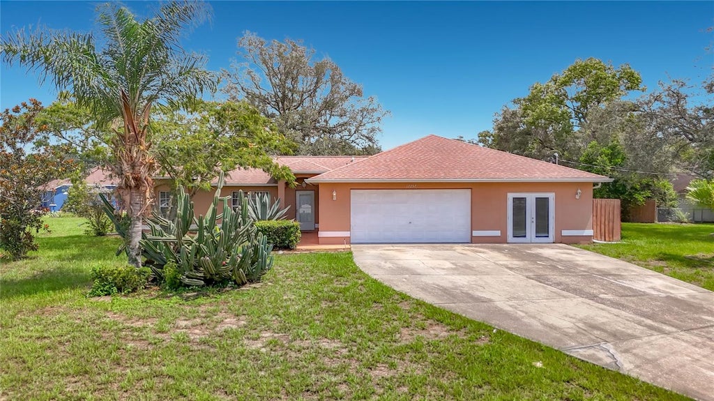 Photo of 12257 Genter Drive, Spring Hill, FL 34609 (MLS # TB8542035)
