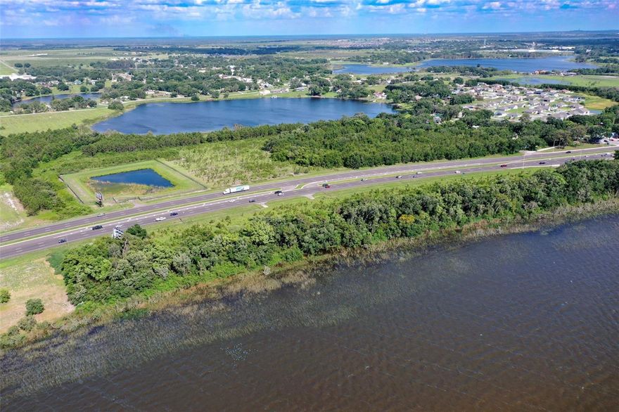 Under contract-accepting backup offers. Location, location, location!! Here is a once in a lifetime opportunity to own over 35 acres of land with multiple zoning uses which sits directly on Lake Hamilton as well as lake Sara and has massive amounts of frontage on both the North and South bound on Hwy 27. The land has 2 income producing billboards and is currently zoned for multifamily, commercial, retail and highway commercial development site as well as having access to sewer lines. The owners are open to dividing the land up in to smaller parcels if required by the buyers. This must be seen in person to be fully appreciated.