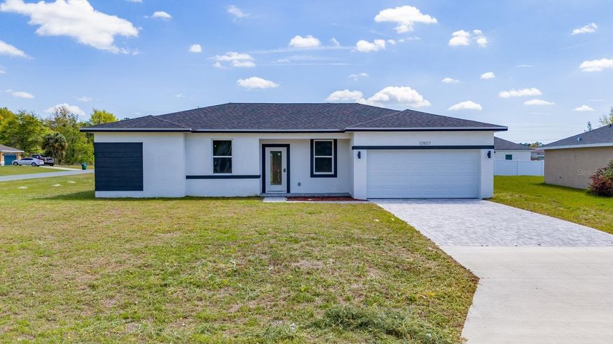 Attention Investors! Brand new 2024 construction on a spacious corner lot in Marion Oaks! This beautifully designed 4-bedroom, 2-bath home offers a modern open-concept layout with abundant natural light, high ceilings, and sleek finishes throughout. The kitchen features large island, granite countertops, and ample cabinet space, perfect for entertaining or everyday living.

The home showcases durable vinyl flooring throughout—NO carpet—along with recessed lighting and a clean, contemporary design. The split-bedroom floor plan provides privacy, with a spacious primary suite and a well-appointed bathroom.

Situated on an oversized 0.28-acre lot, there is plenty of room to add a fence, pool, or outdoor living space.  Located in a growing area of Ocala with no HOA, offering flexibility and freedom for homeowners and investors alike. The property offers flexibility for parking work vehicles, trailers, or recreational vehicles, making it ideal for homeowners or investors needing extra space. 

Move-in ready and ideal for first-time buyers, investors, or anyone looking for a new construction home without the wait. Schedule your showing today!