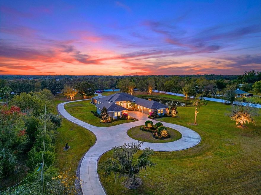 A rare live-work estate offering true infrastructure for modern leadership—comprised of three fully integrated buildings on over five acres with no HOA restrictions.

The primary residence delivers luxury living with purpose, featuring impact-rated doors and windows, chef’s kitchen, private theater, two offices for executive-level remote operations, and a spa-inspired primary suite designed for reset and renewal. Offered partially furnished, the home is engineered for both lifestyle and productivity.

Outside, the property reveals a resort-style environment with pool, spa, sauna, fire features, layered lighting, and multiple seating zones, anchored by a full outdoor kitchen and expansive entertaining terrace ideal for hosting clients, partners, or private events.

The second building provides approximately 3,000 square feet of business-grade infrastructure, including a commercial-grade private gym, executive office with full bath and shower, and a substantial garage and storage facility capable of supporting equipment, vehicles, inventory, or specialty collections.

The third building—a separate three-stall garage—has been adapted as a versatile flex environment suitable for a content studio, command center, private lounge, or additional operations space.

Together, these structures form one unified estate—a private headquarters where lifestyle, enterprise, and performance converge in a way few properties can offer.