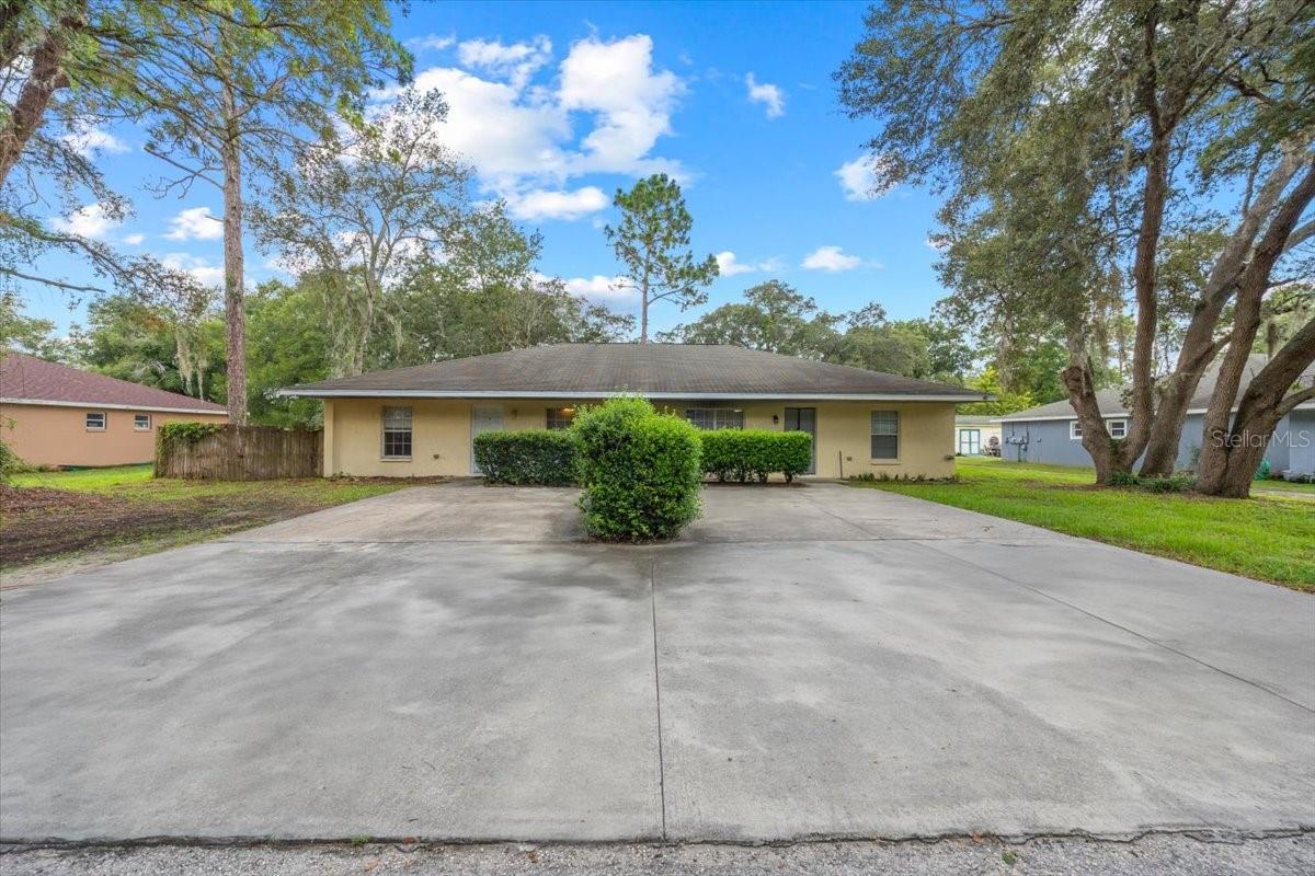 Amazing opportunity to invest in! This concrete block duplex features two units approximately 1248sf each. Located on a large .33 acre lot, each unit is a two bedroom two full bath. Open concept living/dining/kitchen. Plenty of cabinet and countertop space in the kitchen and a nice breakfast bar. Primary bedroom is very spacious with two closets and en suite bathroom. Second bedroom is nicely sized with large closet. There is a bonus room that can be used for an office or den and Washer/dryer hookups are also in this room. Siding glass doors lead to the Units' back yards which are divided by privacy fence. The ROI on this investment is approximately 9%.