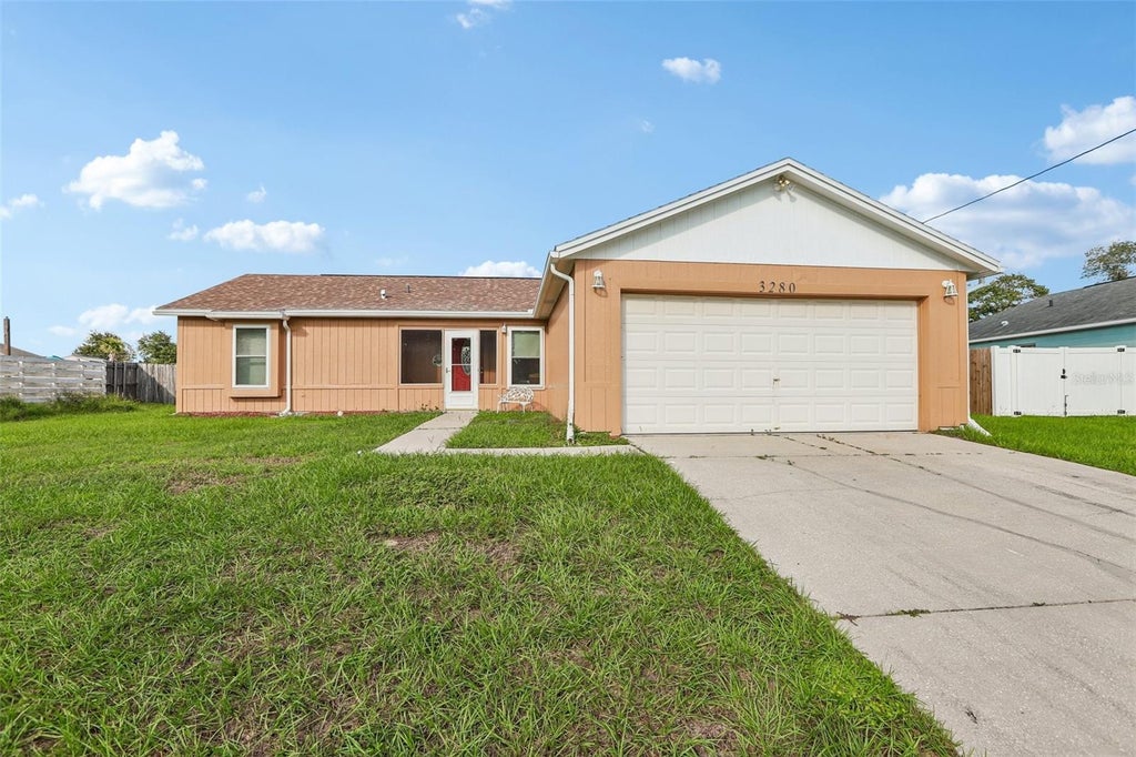 Photo of 3280 Ambassador Avenue, Spring Hill, FL 34609 (MLS # TB8558941)