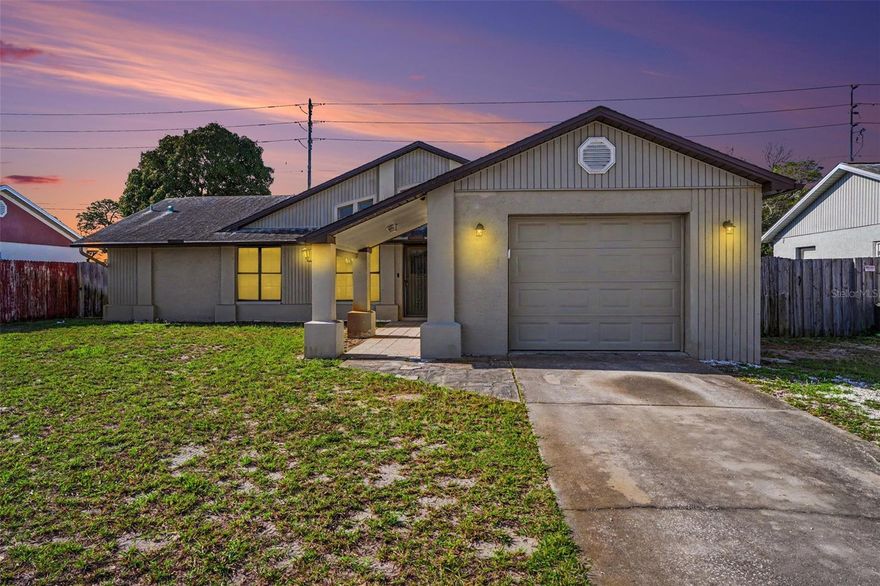 Welcome to this charming 3-bedroom, 2-bath home located in the established community of Holiday Lakes West. Built in 1988, this well-maintained residence offers approximately 1,200 square feet of living space with a desirable split-bedroom floor plan and open-concept layout. Step inside to find vaulted ceilings and abundant natural light, creating a bright and spacious feel throughout the main living areas. The kitchen features ample cabinetry, a breakfast bar, and a pass-through to the dining area. Situated near US-19, offering quick access to Tampa, Clearwater, and St. Petersburg for work, dining, and entertainment. Just a short drive to Gulf beaches and waterfront parks, including Anclote River Park with boat ramps, fishing, and picnic areas.