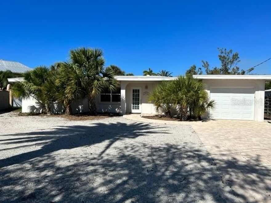CASEY KEY,BOAT LIFT & BOAT DOCK, LONG TERM,SHORT TERM FURNISHED OR UNFURNIShED. Cute one story ranch style house tucked away on a cul-de-sac on private Casey Key. All hardwood floors, one car garage and behind the house is a large lawn leading to a dock on a mangrove lagoon that leads out to the intracoastal waterway, perfect for kayaking . This house has two bedrooms and two bathrooms, the main living areas are all open plan that include the kitchen. Great location not too far from the Albee Farm Bridge to the mainland. Owner approval needed for dogs. HIGH SEASON $7,000 per month, OFF SEASON $4,000 per month and $3500 for an annual lease.  Available Now!!  Call today and enjoy Florida living!!!