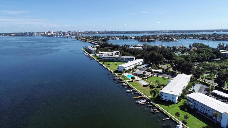 **A Peaceful Slice of Sarasota Bay – A Rare Offering in Sarasota Harbor East**

We’re honored to present this lovingly cared-for home in **Sarasota Harbor East**, a well-regarded 55+ community known for its quiet charm, beautifully kept grounds, and ideal location just west of the John Ringling Causeway. Here, you’re just a short hop from the lively energy of St. Armands Circle and the heart of downtown Sarasota, with its mix of dining, culture, and everyday conveniences.

What truly sets this residence apart are its **inspiring Sarasota Bay views**—offering gentle sunrises, unforgettable sunsets, and a front-row seat to the natural beauty of the water. It's a setting that brings a sense of calm to everyday life.

The 2-bedroom, 2-bath home has been tastefully updated with an open, flowing layout that blends the kitchen and living space—ideal for gathering with loved ones or simply relaxing with the view. The property is offered **fully furnished and move-in ready**, making it an easy transition for anyone looking to enjoy the Sarasota lifestyle right away.

Sarasota Harbor East is a **maintenance-free community** with thoughtful amenities including a heated pool, an active clubhouse, and even **boat docks and kayak storage** for those who love being on the water. Neighbors here tend to become fast friends, and the overall atmosphere is warm and welcoming.

While the community does follow a no-pet policy and leases are allowed after the first year of ownership (minimum one month, once per year), many residents find it’s the kind of place that’s hard to leave once you’ve arrived.

If you’ve been quietly waiting for just the right spot—with views like these and a truly special community—we humbly invite you to consider this rare opportunity. We’d be honored to show you around.