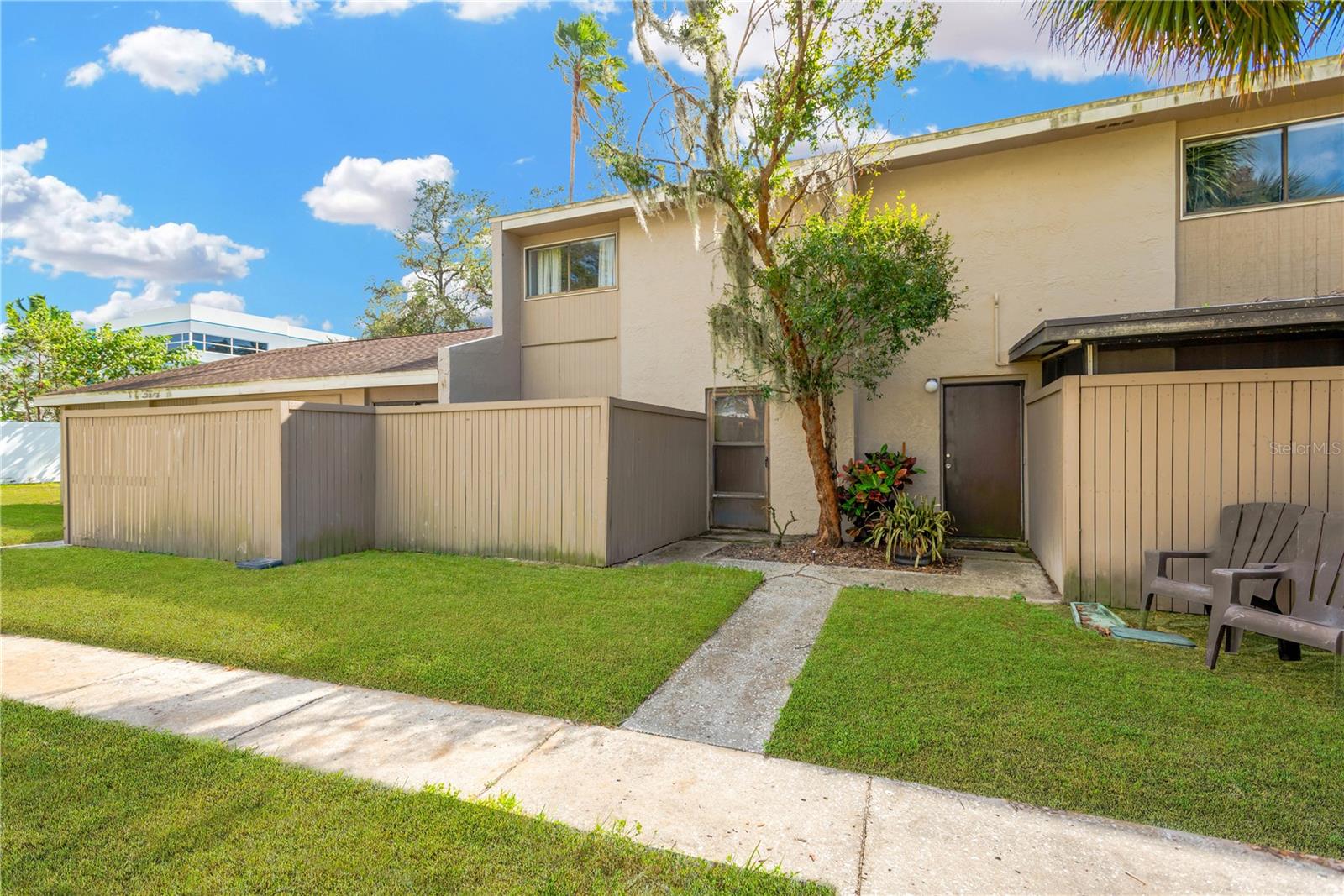 Welcome to Peach Drive, a beautifully maintained 2-bedroom, 1.5-bathroom townhome located in the desirable Temple Terrace neighborhood. This inviting property seamlessly combines modern finishes with classic charm, offering a perfect blend of style, comfort, and functionality. As you step inside, you’re greeted by an open and inviting living area, flooded with natural light from large windows that create a warm and welcoming atmosphere throughout. The living and dining areas provide the ideal space for both entertaining and relaxing. The heart of the home is the gourmet kitchen, featuring loads of countertop space and, beautiful white contemporary cabinetry. Whether you're preparing a casual meal or hosting a dinner party, this kitchen is designed for both convenience and elegance. Each of the bedrooms is generously sized, with tons of natural light and huge closet spaces. A guest bathroom downstairs and an indoor laundry space offer convenience and comfort for all. Step outside and discover a private backyard oasis – a tranquil space perfect for enjoying Florida’s beautiful weather. Whether you're hosting barbecues, gardening, or simply relaxing in peace, the backyard is your own personal retreat. Located in the vibrant and family-friendly community of Temple Terrace, this home is just minutes from top-rated schools, parks, shopping, dining, and major highways, providing both privacy and convenience. With its modern design, exceptional features, and prime location, this home offers the ideal blend of luxury living and Florida charm. Don’t miss out on this incredible opportunity – schedule your private tour today and experience all that this stunning home has to offer!