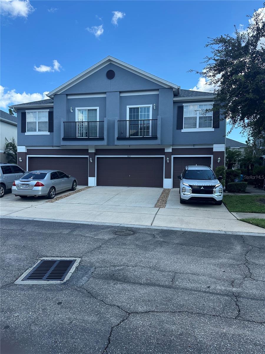 Location, Location, Location. Beautiful Corner Townhome with natural lights from all rooms including a double balcony on the 2nd floor.
2 bedroom, 2 bath and 1 car garage. This amazing fully freshly painted with a large Living room area, Master Bedroom with double vanities, tub and shower including a walk-in closet. Split plan 2nd bedroom on the other side of the vast living dining combo area. Separate Washer and dryer Room.
Kitchen offers an oversize pantry with backsplash. Beautiful Water proof Vinyl Planks throughout except wet areas. No carpet.The club house offers a Fitness center, Playground, Pool, Volleyball, Scenic walking path along the main made lake. Minutes to Orlando International Airport & Lake Nona Medical City. Walking distance to Lee Vista Promenade and many more.